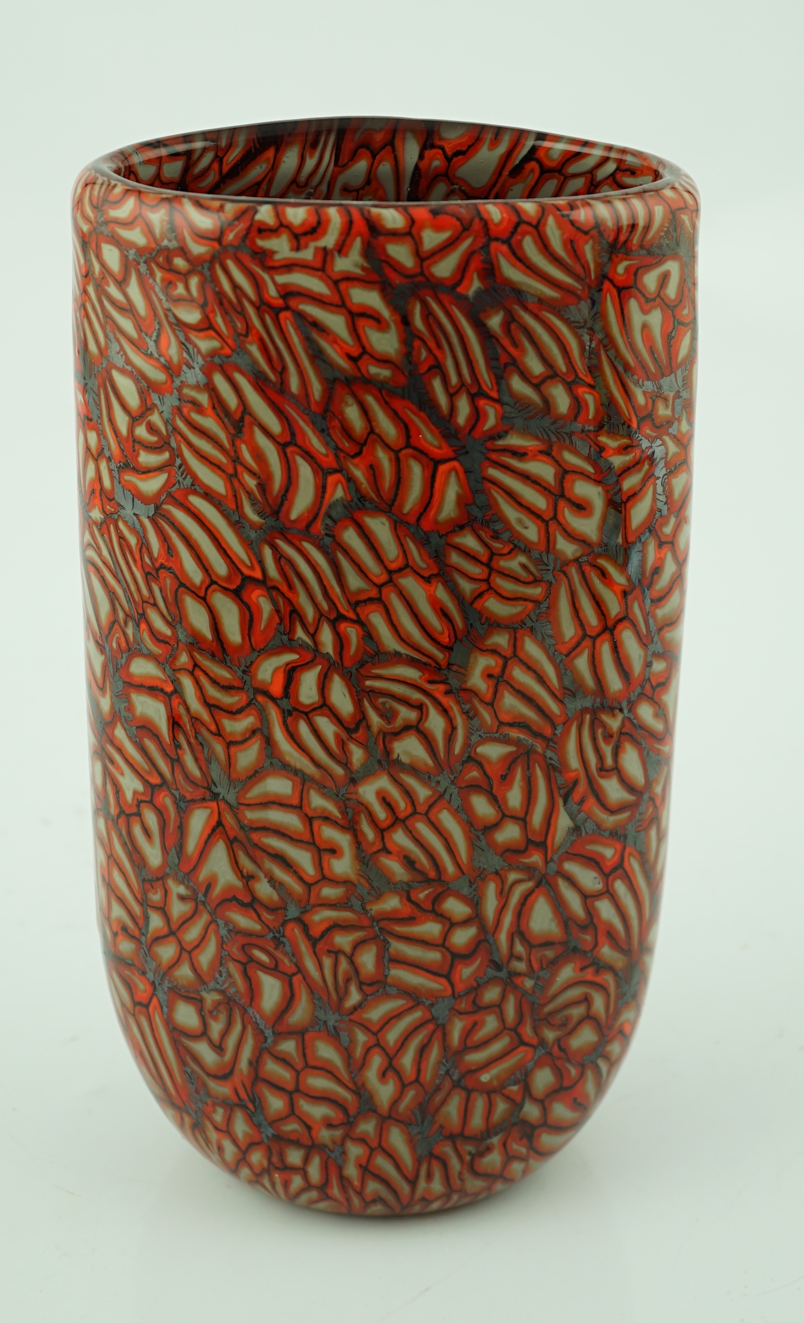 Vittorio Ferro (1932-2012 A Murano glass Murrine vase, cup shaped decorated with red and white stylised flowers, on a black ground, signed, 28.5cm, Please note this lot attracts an additional import tax of 20% on the ham